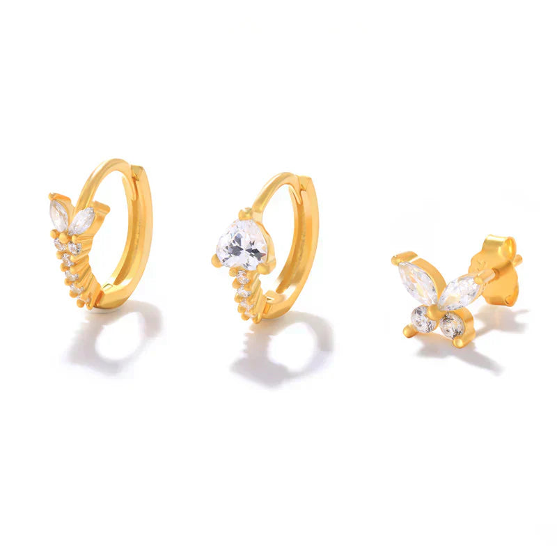 Eva-Marie – Cercei delicați aurii cu formă fluidă.