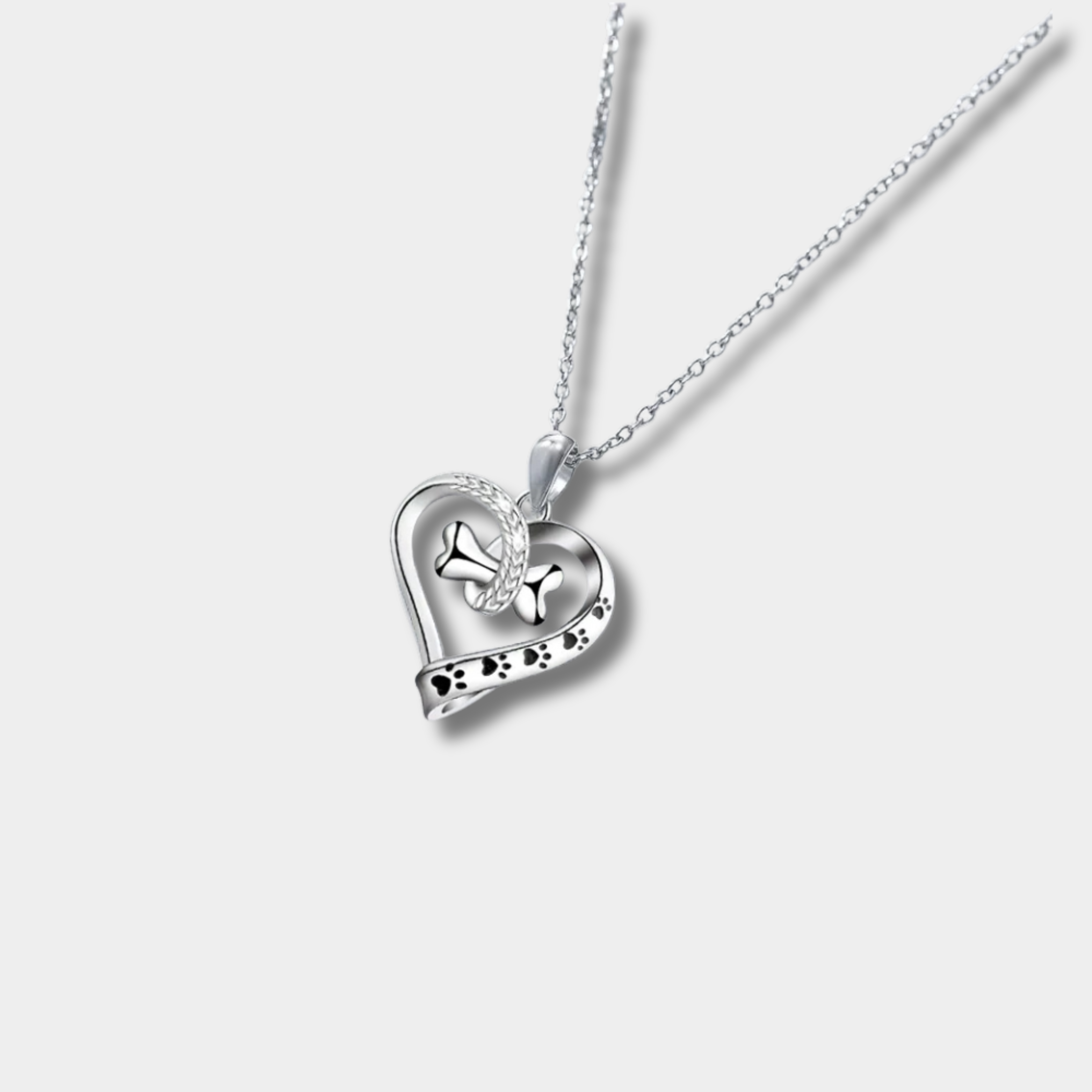 Set de bijuterii cu 2 piese cu pandantive în formă de labă, inimă și os